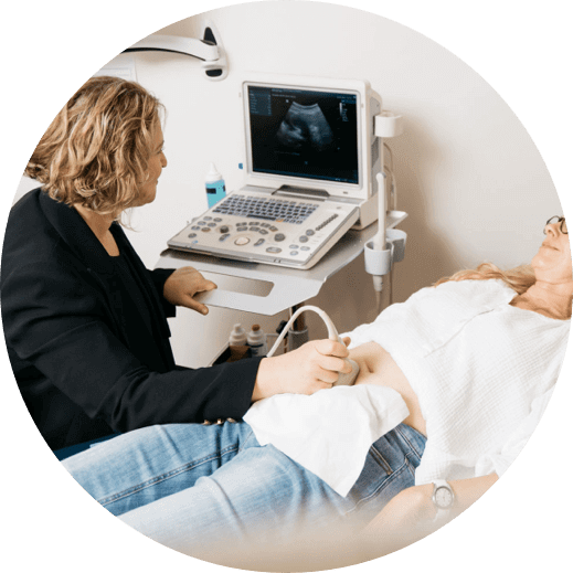 Dr. Victoria Nisenblat conducts an ultrasound examination on a patient with precision and expertise